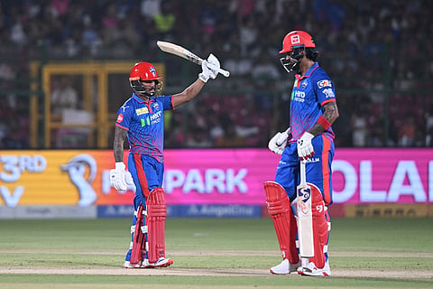 Delhi Capitals' Pathum Nissanka celebrates his fifty runs as batting partner KL Rahul looks on during the Indian Premier League cricket match between Delhi Capitals and Rajasthan Royals in Jaipur, India.