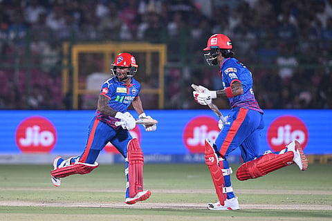 Delhi Capitals' Pathum Nissanka with batting partner KL Rahul run between the wickets to score during the Indian Premier League cricket match between Delhi Capitals and Rajasthan Royals in Jaipur, India.