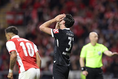 Freiburg's Igor Matanovic reacts after a missed chance to score during the Europa League semifinal, first leg, soccer match between SC Braga and Freiburg in Braga, Portugal.