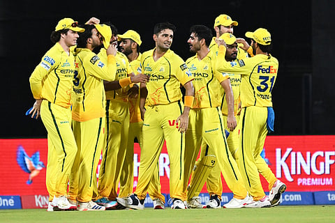 Chennai Super Kings' Anshul Kamboj, center, celebrates with teammates the wicket of Mumbai Indians' Will Jacks during the Indian Premier League cricket match between Chennai Super Kings and Mumbai Indians in Chennai, India.