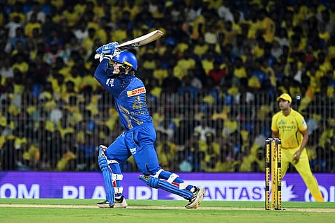 Mumbai Indians' Ryan Rickelton plays a shot during the Indian Premier League cricket match between Chennai Super Kings and Mumbai Indians in Chennai, India.