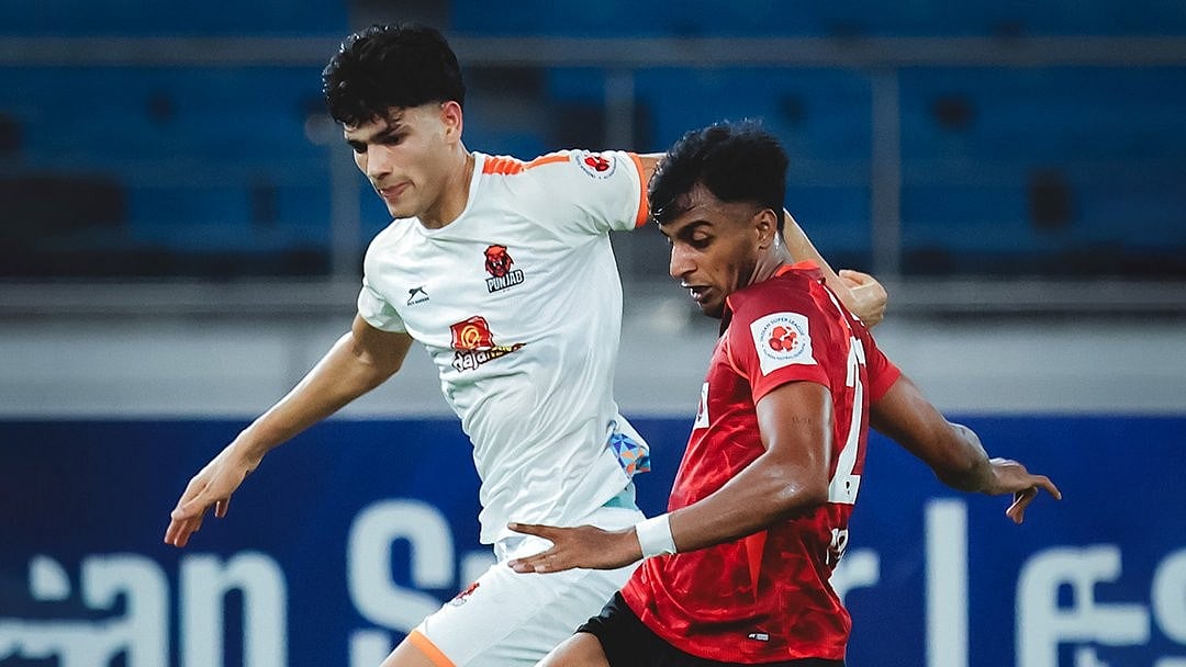 SC Delhi and Punjab FC footballers fighting for the ball during ISL 2025-26 match at Delhi.  - IndSuperLeague/X