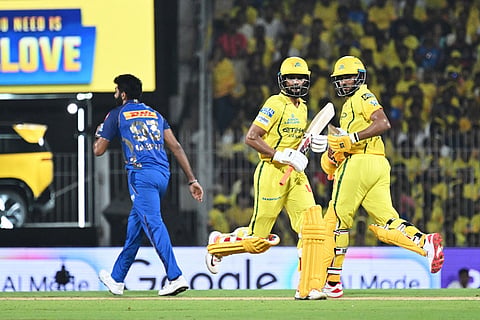 Chennai Super Kings' captain Ruturaj Gaikwad, center, and batting partner Urvil Patel run between the wickets during the Indian Premier League cricket match between Chennai Super Kings and Mumbai Indians in Chennai, India.