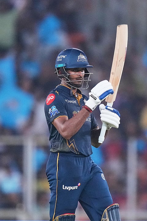 Gujarat Titans' Sai Sudharsan celebrates his fifty runs during the Indian Premier League cricket match between Gujarat Titans and Punjab Kings in Ahmedabad.
