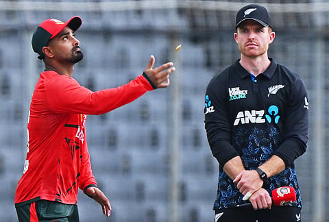 Bangladesh's captain Litton Das, left, tosses the coin as New Zealand's captain Nick Kelly looks on before the start of the third T20 international cricket match between Bangladesh and New Zealand in Mirpur, Bangladesh.