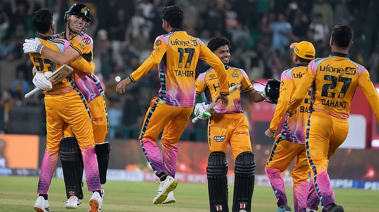 Peshawar Zalmi's Aaron Hardie, second left, celebrates with teammates after winning the Pakistan Super League final cricket match against Hyderabad Kingsmen, in Lahore, Pakistan, Sunday, May 3, 2026 - (AP Photo/K.M. Chaudary)
