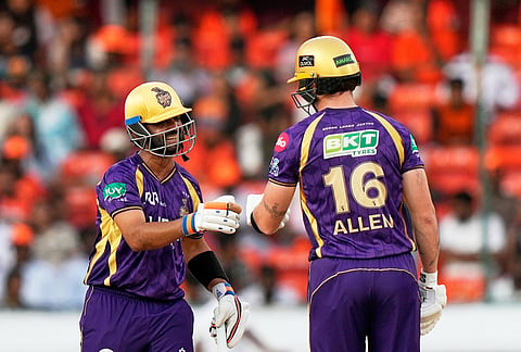 Kolkata Knight Riders' captain Ajinkya Rahane, left and Kolkata Knight Riders' Finn Allen fist with gloves during the Indian Premier League cricket match between Sunrisers Hyderabad and Kolkata Knight Riders in Hyderabad.