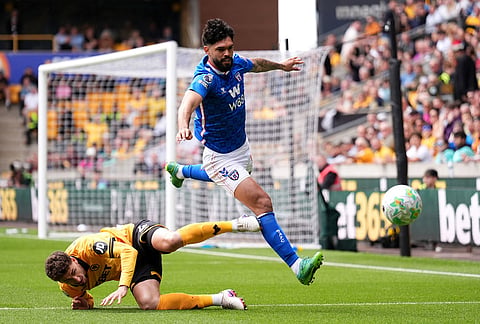 Wolverhampton Wanderers' Santiago Bueno, left, and Sunderland's Omar Alderete battle for the ball during their English Premier League soccer match in Wolverhampton, England.