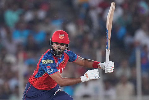 Punjab Kings' Prabhsimran Singh plays a shot during the Indian Premier League cricket match between Gujarat Titans and Punjab Kings in Ahmedabad.
