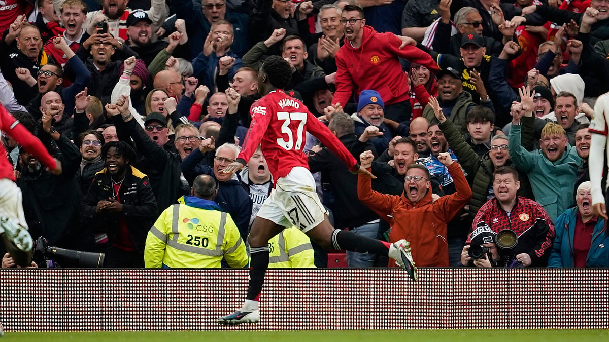 Manchester United's Kobbie Mainoo celebrates after scoring his side's third goal during the English Premier League soccer match between Manchester United and Liverpool in Manchester, England, Sunday, May 3, 2026. - | Photo: AP/Dave Thompson