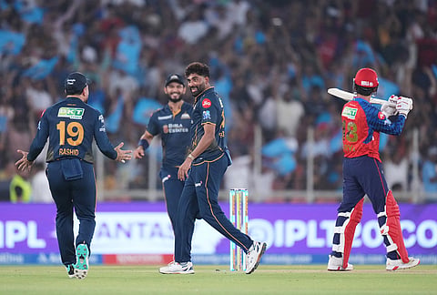 Gujarat Titans' Mohammed Siraj celebrates the wicket of Punjab Kings' Priyansh Arya during the Indian Premier League cricket match between Gujarat Titans and Punjab Kings in Ahmedabad.