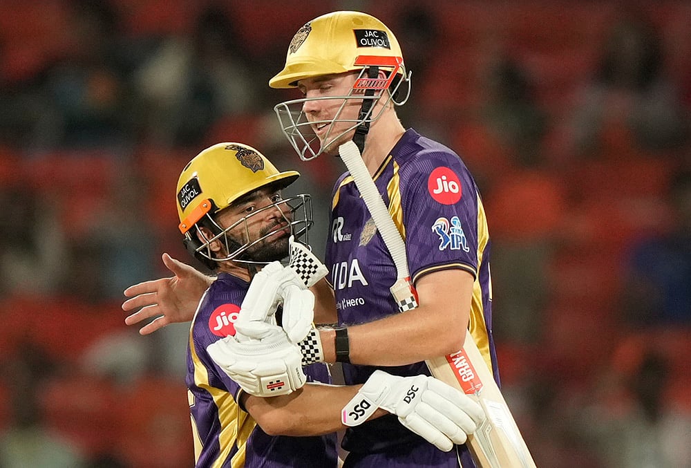 | Photo: AP/Mahesh Kumar A. : Kolkata Knight Riders' Rinku Singh, left and Cameron Green celebrate their win over Sunrisers Hyderabad during the Indian Premier League cricket match in Hyderabad.