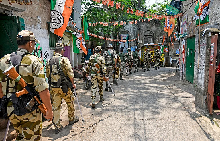 Security personnel patrol on the eve of counting and results of the West Bengal Assembly polls - - pti