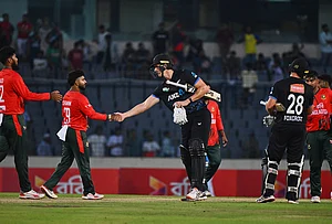 | Photo: AP/Mosaraf Hossain : New Zealand's Bevon Jacobs shakes hands with Bangladesh's players after winning the third T20 international cricket match between Bangladesh and New Zealand in Mirpur, Bangladesh.