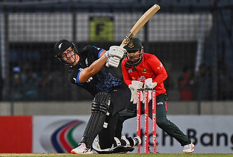 New Zealand's Bevon Jacobs plays a shot during the third T20 international cricket match between Bangladesh and New Zealand in Mirpur, Bangladesh.
