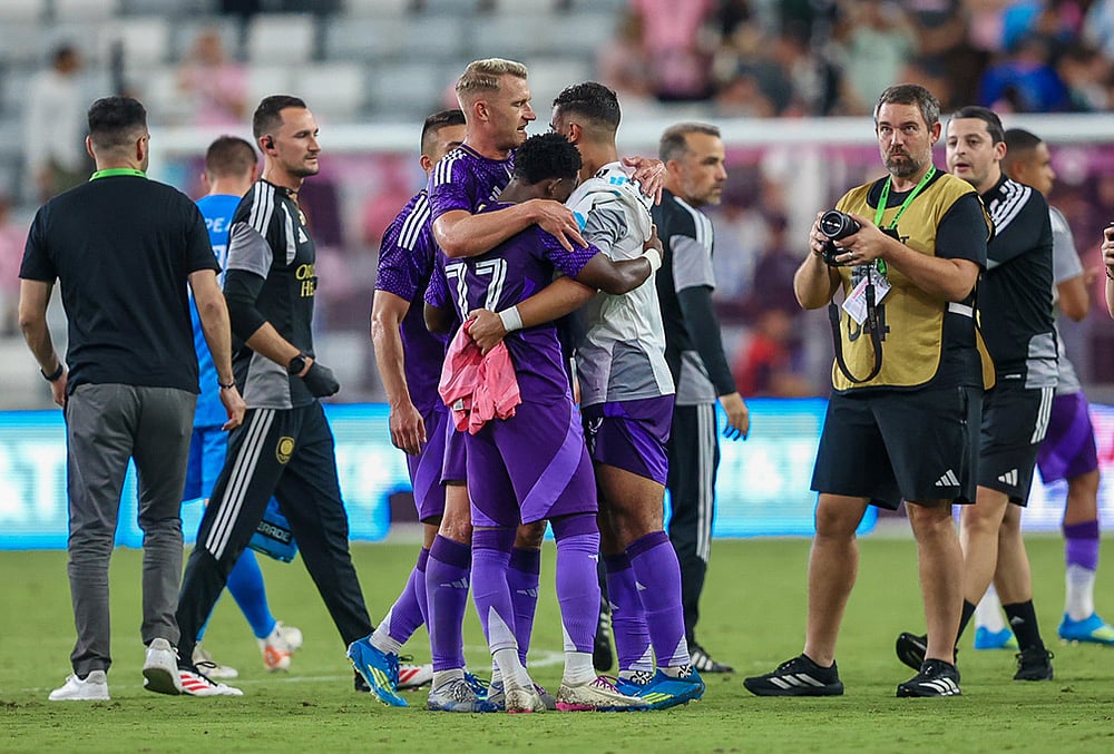 Orlando City players celebrate together at the end of the second half during an MLS soccer match against the Inter Miami in Miami.  - | Photo: AP/Chris Arjoon