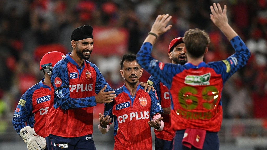 Yuzvendra Chahal, centre, celebrates with teammates the wicket of Yashasvi Jaiswal during the Indian Premier League match between Rajasthan Royals and Punjab Kings in New Chandigarh. - AP