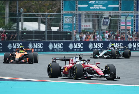 Ferrari driver Charles Leclerc of Monaco steers his car during the Miami Formula One Grand Prix auto race, in Miami Gardens, Florida.