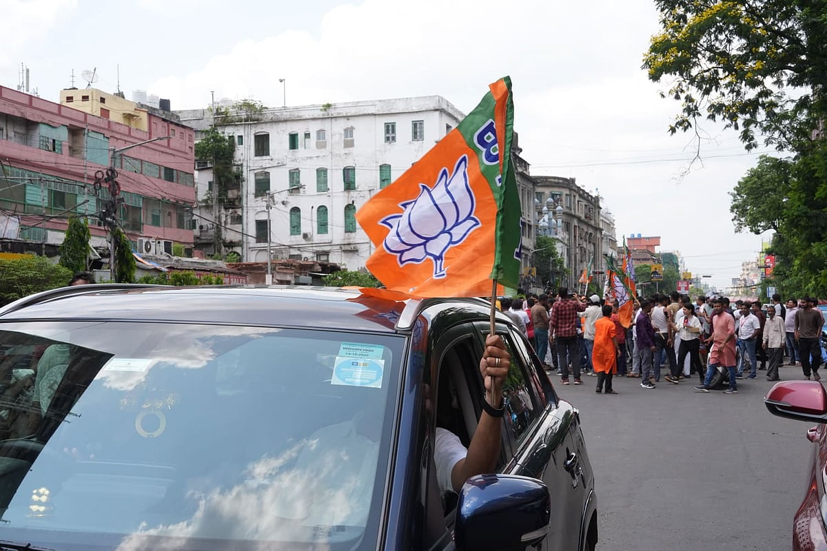 BJP workers celebrate as trends show the party leading in the West Bengal Assembly elections, in Kolkata. - | Photo: Sandipan chatterjee/Outlook