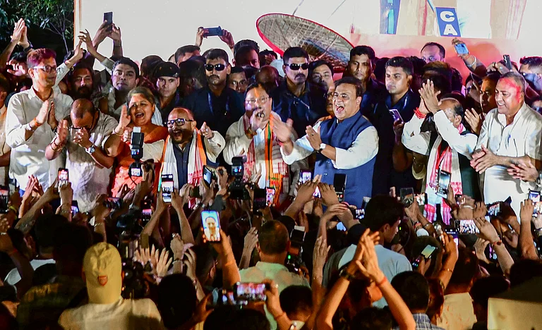 Guwahati: Assam Chief Minister and BJP candidate from Jalukbari constituency, Himanta Biswa Sarma, celebrates with party workers after winning in the state Assembly election results, in Guwahati, Monday, May 4, 2026. - PTI