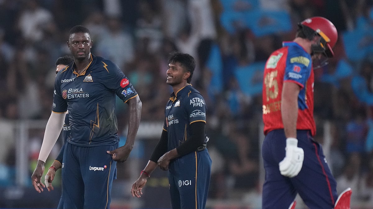 Gujarat Titans' Jason Holder celebrates the wicket of Punjab Kings' Xavier Bartlett during the Indian Premier League cricket match - Ajit Solanki/AP