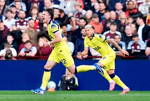 Tottenham's Conor Gallagher, left, celebrates scoring their side's first goal during the English Premier League soccer match between Aston Villa and Tottenham Hotspur in Birmingham, England.