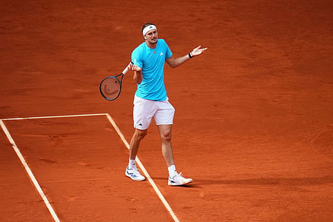 Alexander Zverev, of Germany, gestures during the men's singles tennis final match against Jannik Sinner, of Italy, at the Madrid Open tennis tournament in Madrid, Spain.