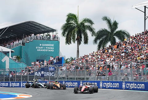 From left, Ferrari driver Charles Leclerc of Monaco, McLaren driver Lando Norris of Britain, and Mercedes driver Kimi Antonelli of Italy steer their cars during the Miami Formula One Grand Prix auto race, in Miami Gardens, Florida.