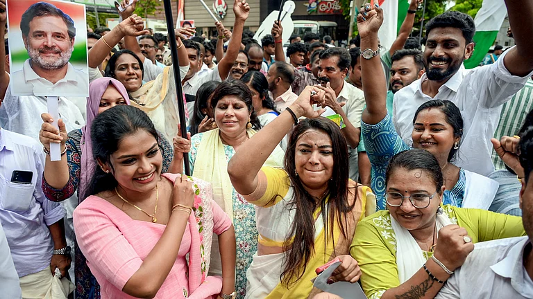 Congress workers celebrate during vote tabulation on the day of Kerala Assembly election results, in Thiruvananthapuram, Monday, May 4, 2026. - Photo: PTI/S.Gopakumar