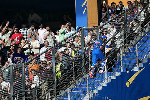 Mumbai Indians' Rohit Sharma walks back after loosing his wicket during the Indian Premier League cricket match between Mumbai Indians and Lucknow Super Giants in Mumbai, India.