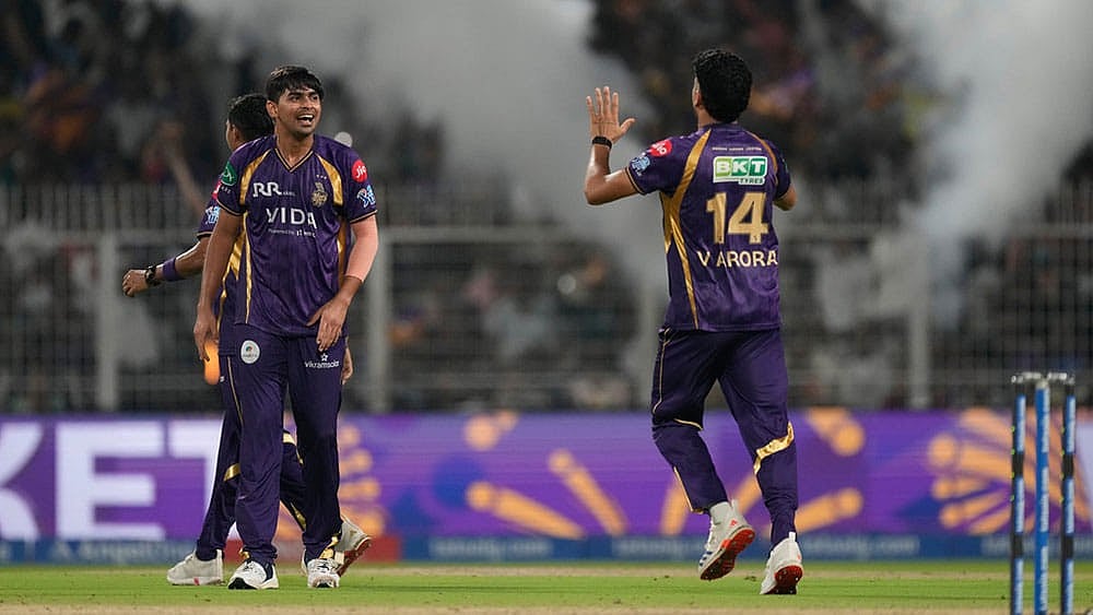 Kolkata Knight Riders' Kartik Tyagi, left, celebrates the wicket of Lucknow Super Giants' Nicholas Pooran during the Indian Premier League cricket match between Kolkata Knight Riders and Lucknow Super Giants in Kolkata, India. - | Photo: AP/Bikas Das