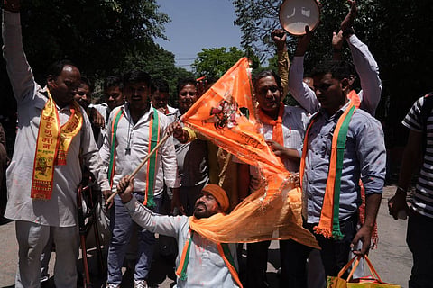 BJP supporters celebrate in BJP Delhi office.