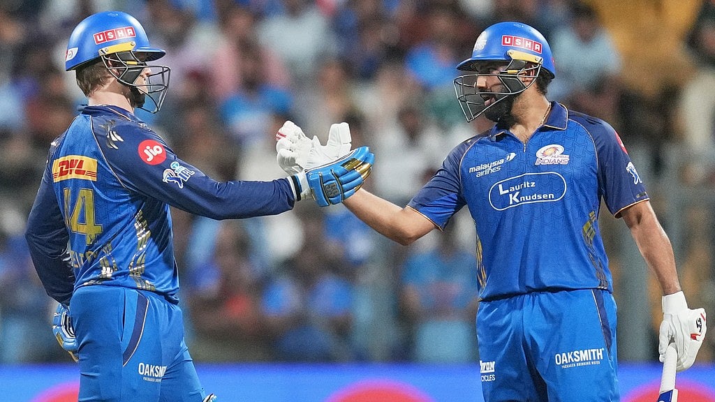 AP/Rafiq Maqbool : Ryan Rickelton, left, celebrates his fifty with Rohit Sharma during the Indian Premier League match between Mumbai Indians and Lucknow Super Giants in Mumbai.