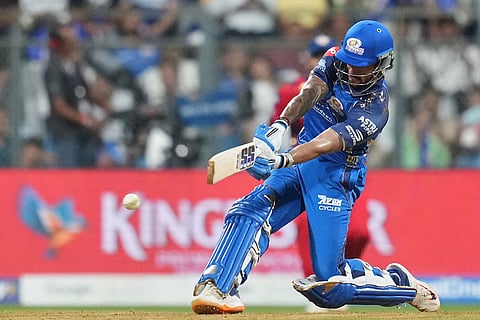 Mumbai Indians' Tilak Varma plays a shot during the Indian Premier League cricket match between Mumbai Indians and Lucknow Super Giants in Mumbai, India.