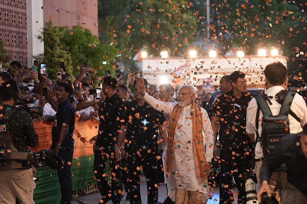 Photo: Tribhuvan Tiwari : Prime Minister Narendra Modi arrives at the BJP headquarters to celebrate the party's performance in Assembly elections across four states and one union territory, in New Delhi.