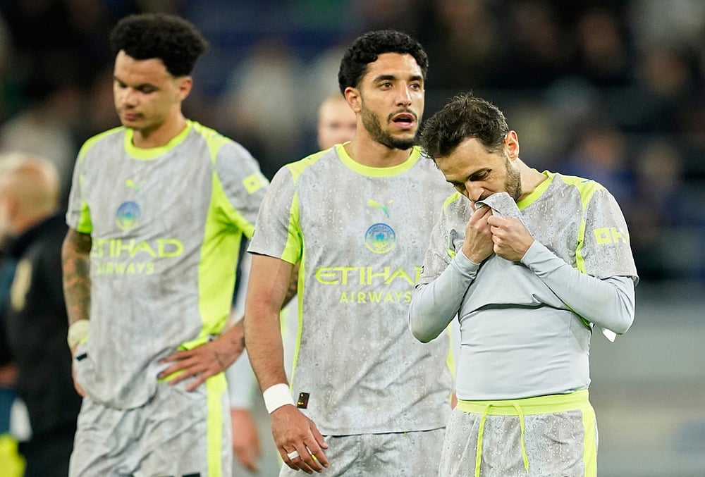| Photo: AP/Dave Thompson : Manchester City's Bernardo Silva, right, reacts after the Premier League soccer match between Manchester City and Everton in Liverpool, England.