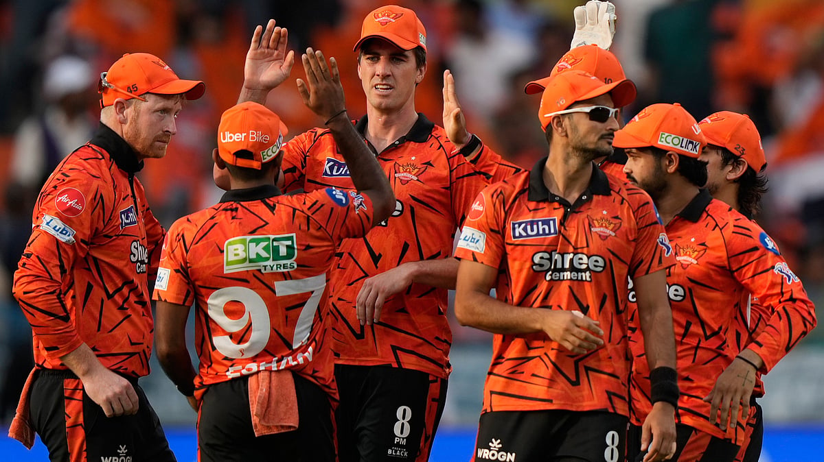 AP Photo : Sunrisers Hyderabad's captain Pat Cummins, second from left, celebrates with teammates the wicket of Kolkata Knight Riders' Finn Allen during the Indian Premier League cricket match between Sunrisers Hyderabad and Kolkata Knight Riders in Hyderabad, India.