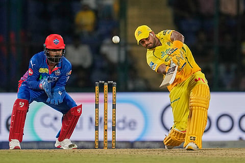 Chennai Super Kings' Kartik Sharma hits a six during the Indian Premier League cricket match between Chennai Super Kings and Delhi Capitals in New Delhi, India.