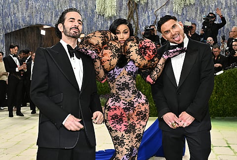 Marc Jacobs, from left, Cardi B and Char Defrancesco arrive at The Metropolitan Museum of Art's Costume Institute benefit gala celebrating the opening of the "Costume Art" exhibition in New York.