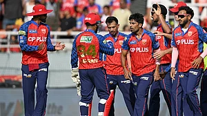 AP Photo : Shashank Singh celebrating with teammates after dismissing Abhishek Sharma during PBKS vs SRH IPL 2026 match at Mullanpur.