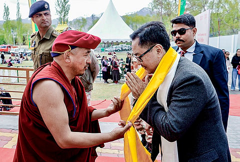 Union Minister Kiren Rijiju being greeted by a monk during his visit to Dharma Center, in Leh, Ladakh. 