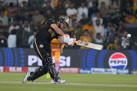 Hyderabad Kingsmen's Maaz Sadaqat plays a shot during the Pakistan Super League final cricket match between Peshawar Zalmi and Hyderabad Kingsmen, in Lahore, Pakistan.