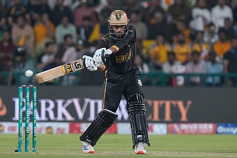 Hyderabad Kingsmen's Usman Khan plays a shot during the Pakistan Super League final cricket match between Peshawar Zalmi and Hyderabad Kingsmen, in Lahore, Pakistan.