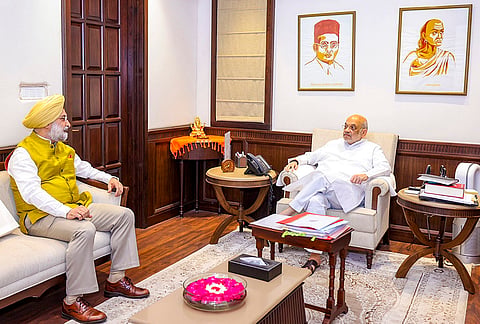 Union Home Minister Amit Shah during a meeting with Delhi Lt. Governor Taranjit Singh Sandhu, in New Delhi. 