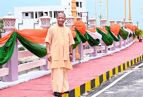 Uttar Pradesh Chief Minister Yogi Adityanath during the inauguration of the two-lane bridge in Taramandal, Gorakhpur district. 