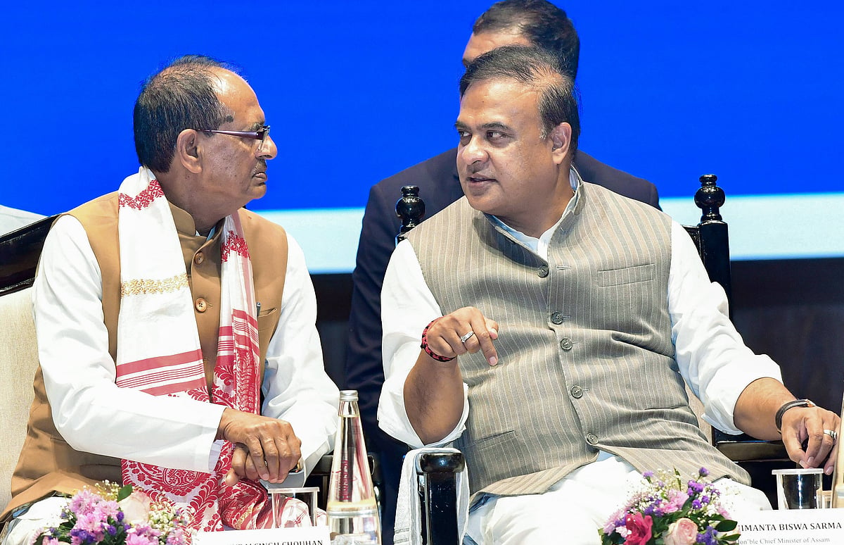 Assam Chief Minister Himanta Biswa Sarma in conversation with Union Minister of Agriculture & Farmers Welfare and Rural Development Shivraj Singh Chouhan. - PTI