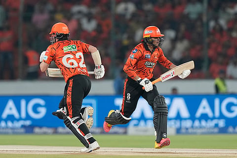 Sunrisers Hyderabad's Travis Head and Abhishek Sharma run between the wickets to score the Indian Premier League cricket match between Sunrisers Hyderabad and Punjab Kings in Hyderabad, India