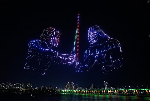 Star Wars themed drones show in the night sky to celebrate Star Wars Day at a park along the Han River in Seoul, South Korea.