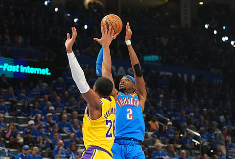Oklahoma City Thunder guard Shai Gilgeous-Alexander (2) shoots over Los Angeles Lakers forward Rui Hachimura (28) in the second half of Game 1 in a second-round NBA basketball playoffs series in Oklahoma City.