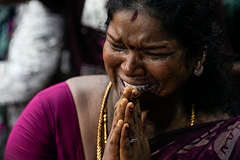A supporter reacts during a roadshow led by DMK President MK Stalin, unseen, at the Kolathur constituency, from where Stalin contested in the Tamil Nadu Assembly elections, a day after the declaration of results, in Chennai.